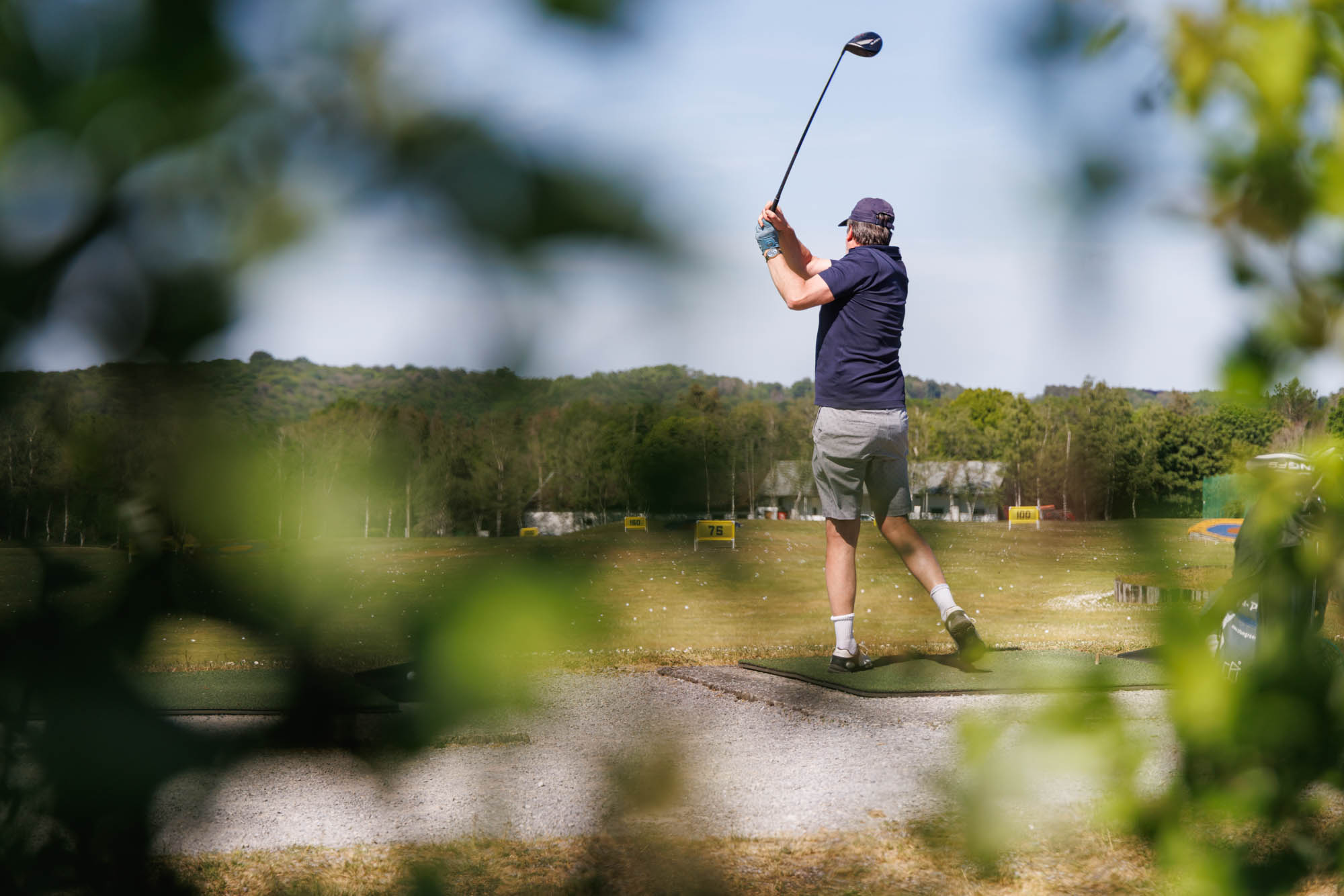 Joueur en action sur le terrain du Golf de Durbuy